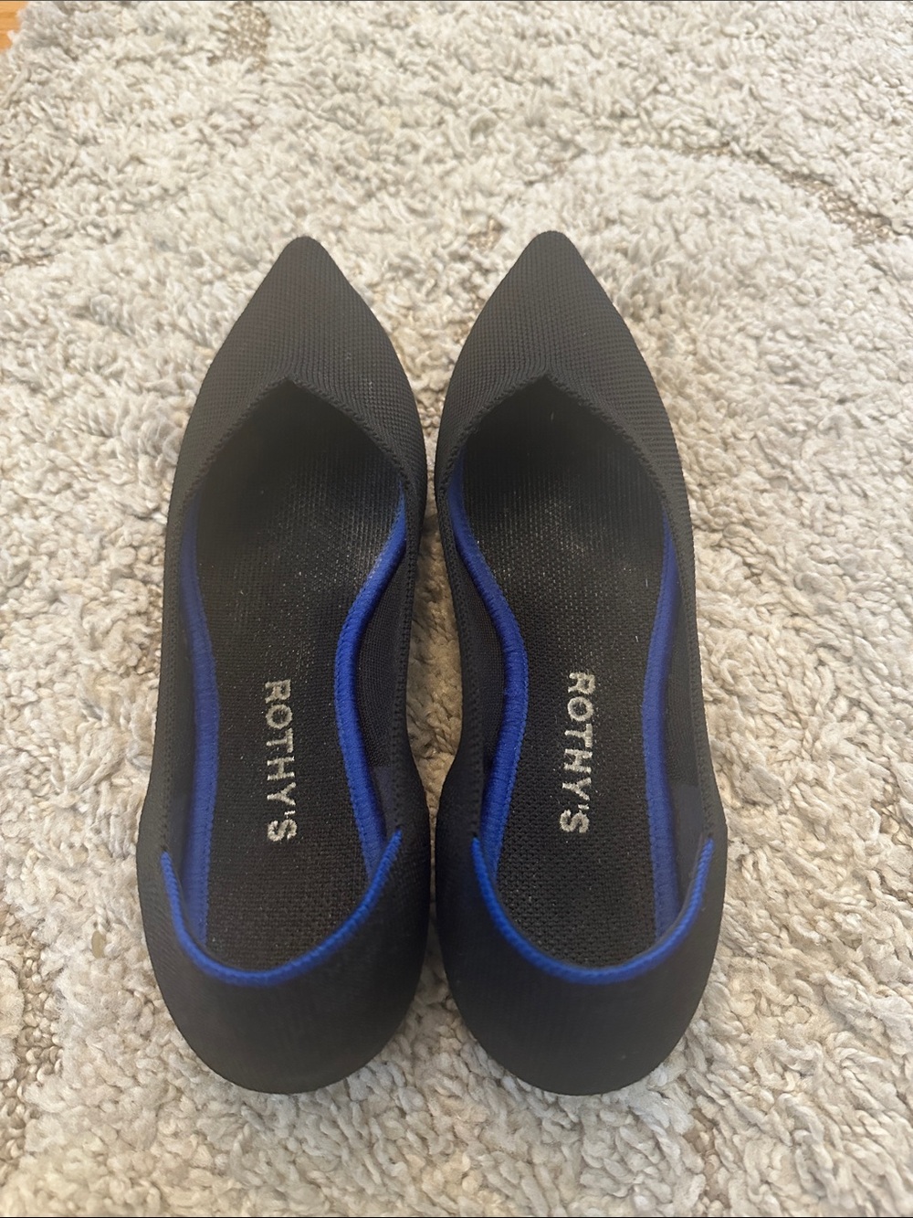 Rothy's Black Pointed Flats with Blue Trim